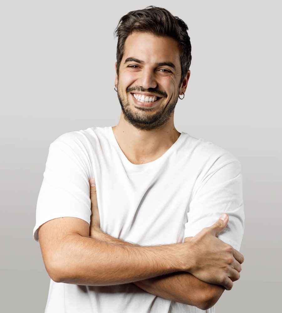 cheerful-young-beard-man-looking-at-camera-59XCDHQ